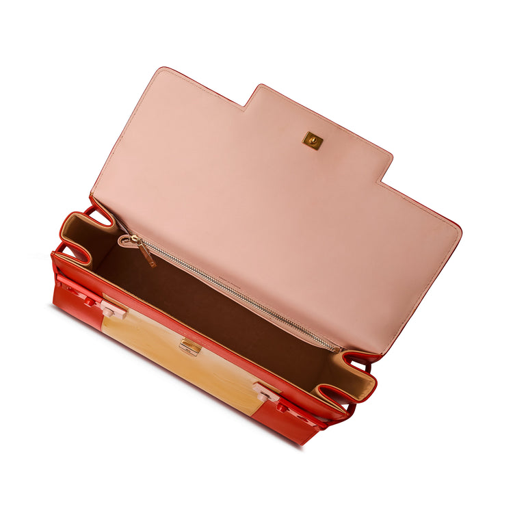 Tempête MM leather top handle bag by Other Designers, featuring a sleek design and structured silhouette with top handles.