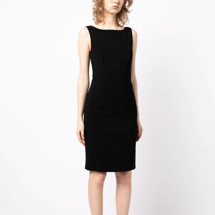 Prada scoop back sleeveless dress featuring a fitted design and elegant fabric, shown on a model.