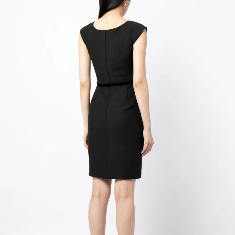 Prada belted wool dress featuring a tailored fit and classic design, shown on a model with a neutral background.