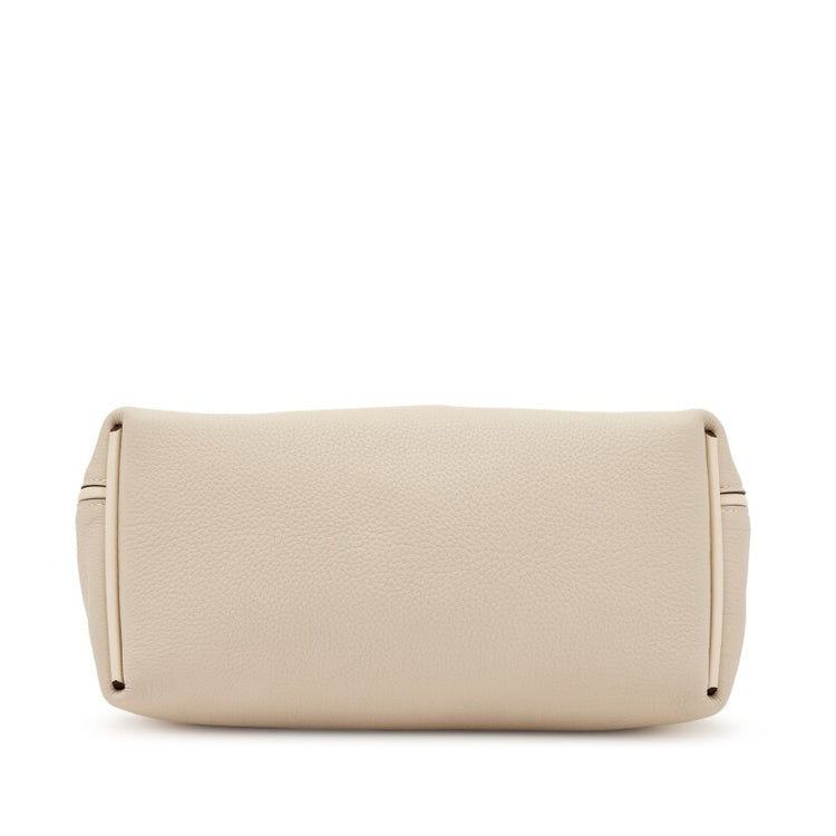 Hermès Nata Togo 24/24 tote bag shown from the bottom, featuring soft leather and structured design in neutral color.