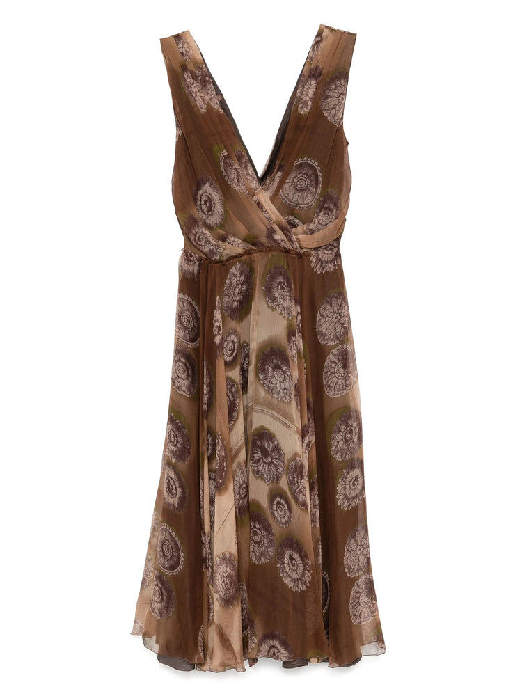 Brown patterned dress on a white background