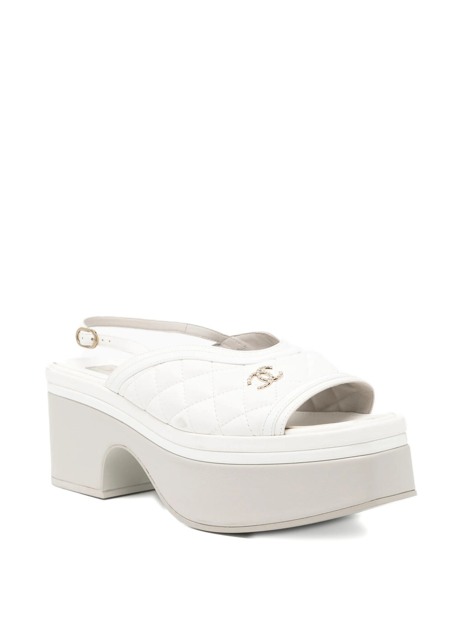 Chanel White platform sandals on a white background
