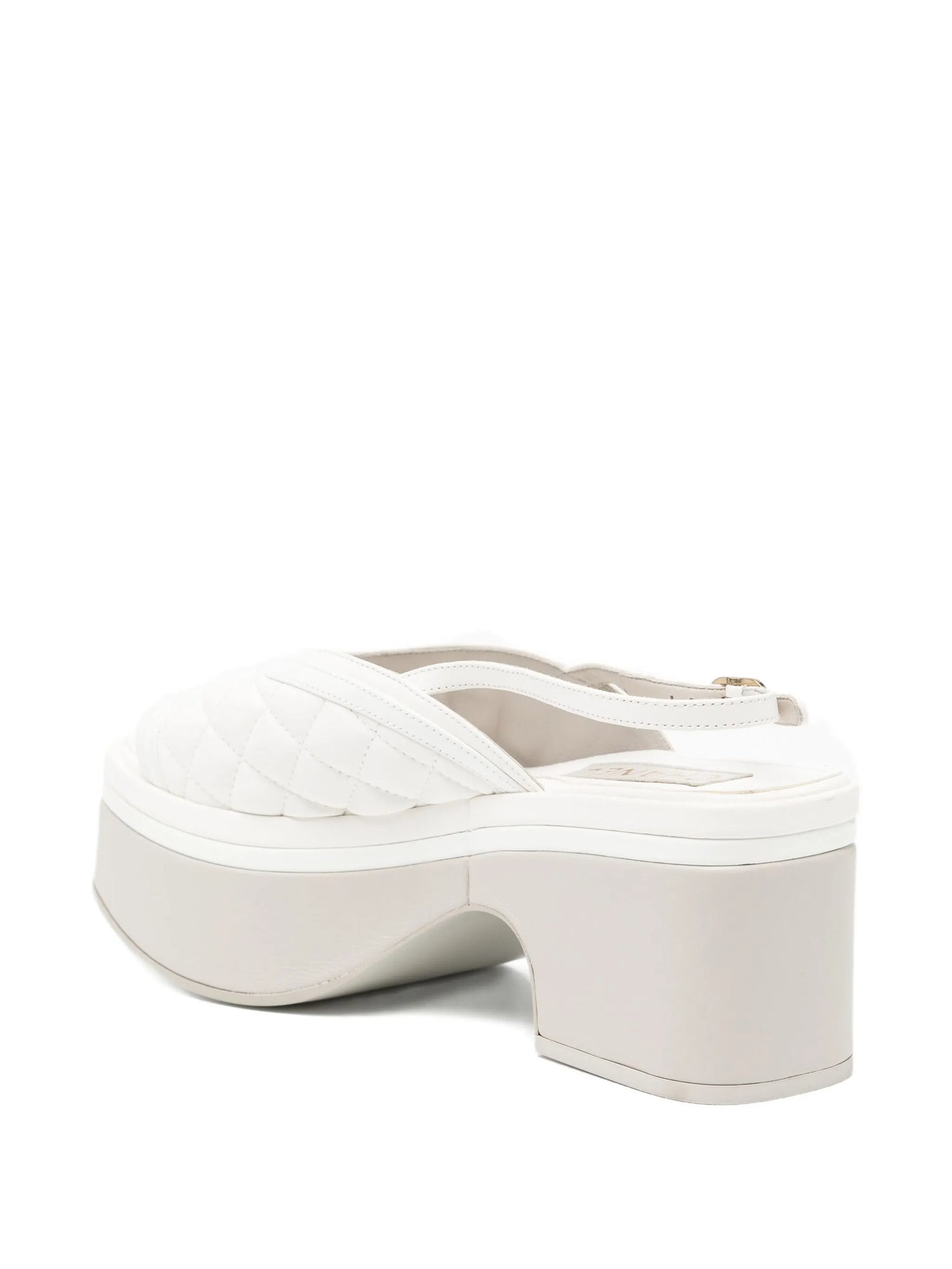 Chanel White platform sandals on a white background