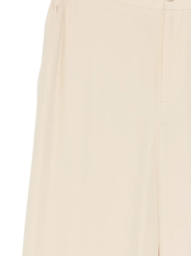 Gucci silk wide-leg trousers with a relaxed fit and smooth fabric, shown in a stylish and elegant design.