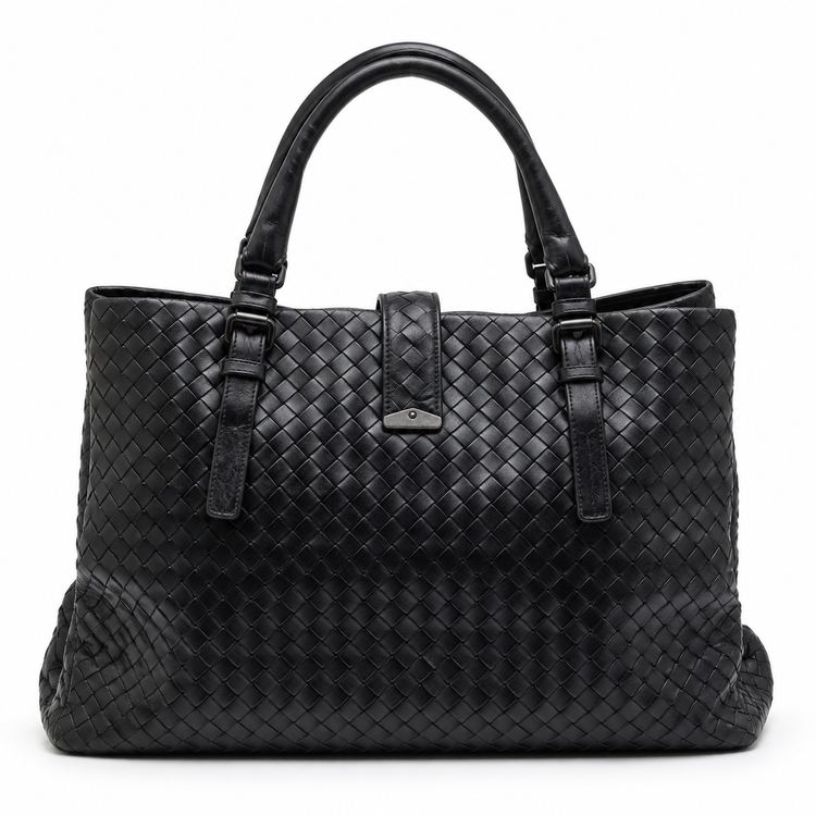 Bottega Veneta Intrecciato Roma Tote Bag in black woven leather with dual top handles, central metal lock fastening and hanging key clochette.