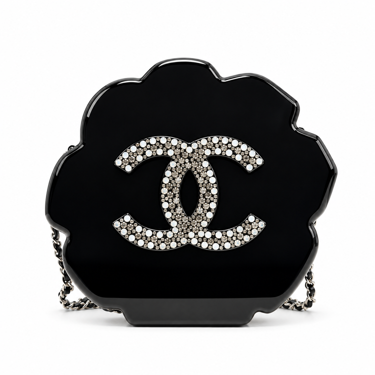 Chanel Camellia Minaudière evening clutch bag with floral design, compact style, and elegant gold-tone hardware.