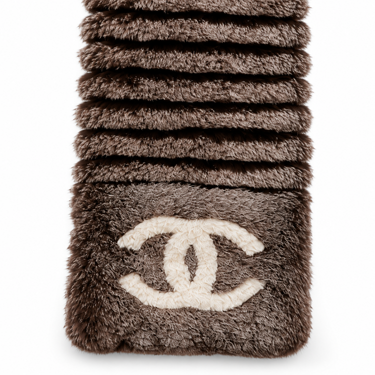Chanel Orylag and fabric CC scarf featuring luxurious textures in a stylish design.