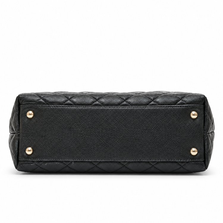 Chanel 2021 Medium Coco Handle Flap Bag in black quilted caviar leather with gold-tone CC hardware, top handle and detachable chain strap.