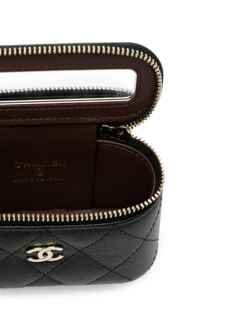 Chanel quilted caviar mini vanity bag charm with gold-tone hardware, small accessories for handbag decoration.