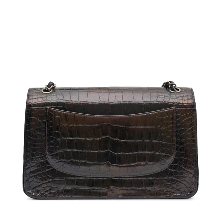 Back view of Chanel Jumbo Double Flap Shoulder Bag, showcasing its iconic quilted leather design and chain strap detail.