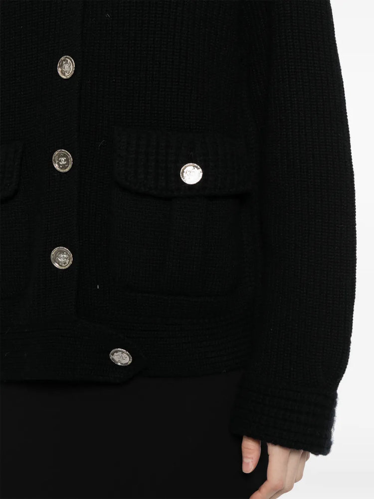 Pre-owned CHANEL cashmere knit cardigan, soft beige color, long sleeves, and button-up front, luxurious and stylish women’s top.