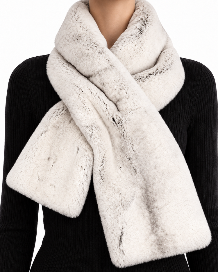 Chanel Sport Line fur scarf featuring luxurious Orylag fur, stylishly draped with the iconic Chanel branding visible.