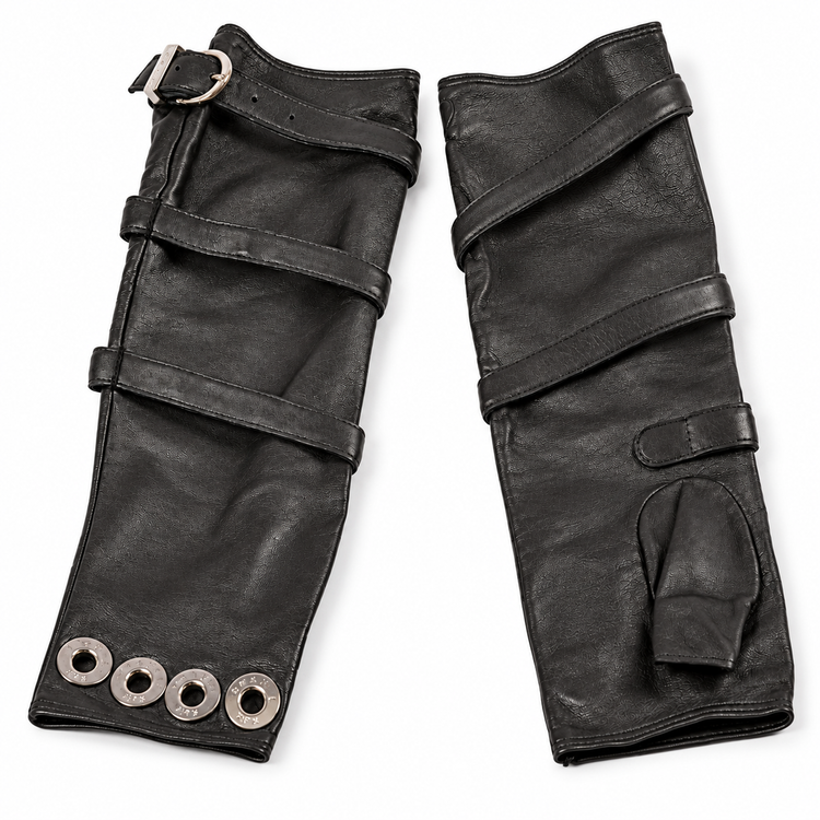 Black lambskin long fingerless gloves by Chanel, showcasing sleek, luxurious leather with a fitted design and stylish fingerless style.