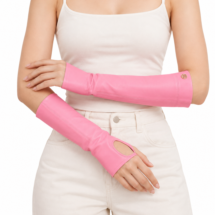 Chanel by Karl Lagerfeld Barbie pink kidskin fingerless gloves with gold-tone CC medallion, mid-length silhouette and visible signs of wear.