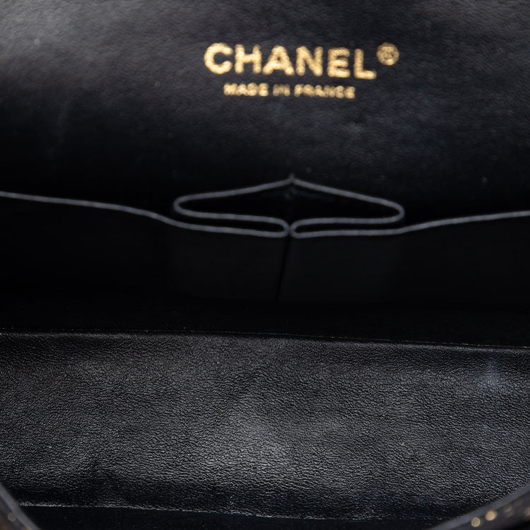 Chanel medium quilted lace chevre and lace classic double flap shoulder bag with gold-tone hardware and chain strap.