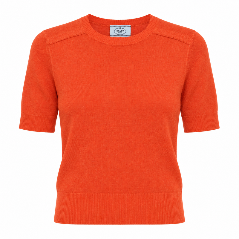 Prada burnt orange wool and silk short-sleeve knit top with crew neckline, ribbed trims and a lightweight fitted silhouette.