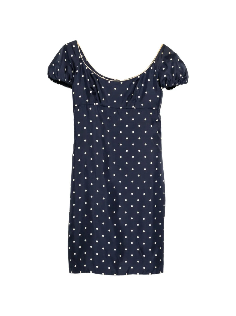 Dior polka dot dress featuring a classic pattern, fitted silhouette, and elegant design, perfect for stylish occasions.