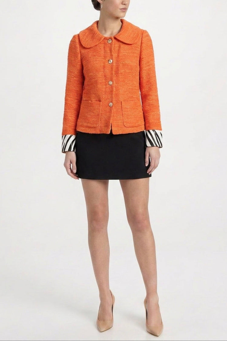 Orange textured blazer by Dolce & Gabbana, stylish jacket with detailed fabric and classic fit.