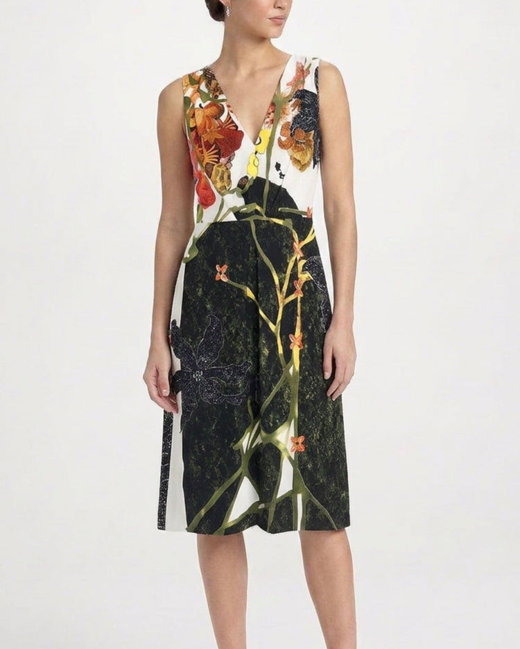 Prada floral V-neck dress with vibrant pattern, sleeveless design, and elegant flowy fabric, perfect for summer or special occasions.