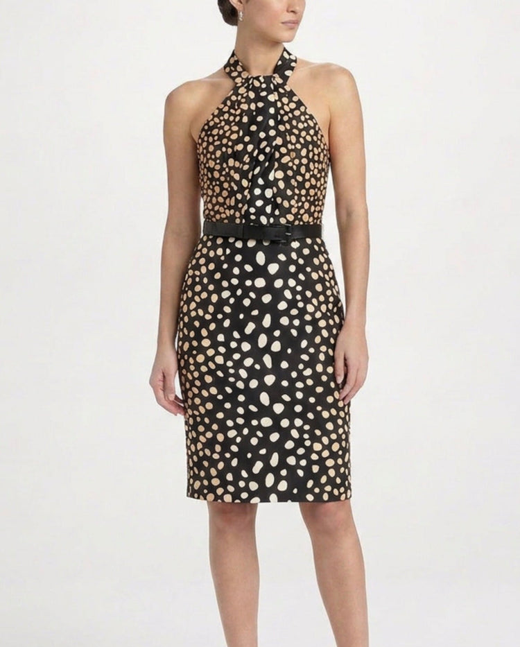 Dior 2009 polka dot silk halterneck dress featuring a flowing silhouette and stylish halterneck design.