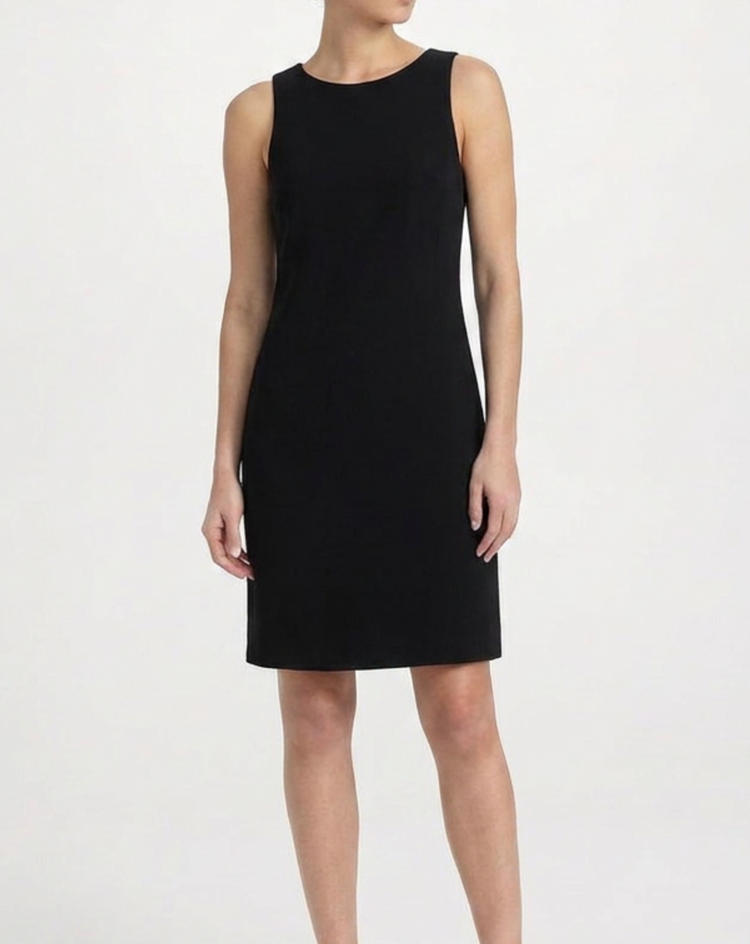 Dior minimal tailored wool dress displayed on a hanger, showcasing sleek design and classic silhouette for elegant style.
