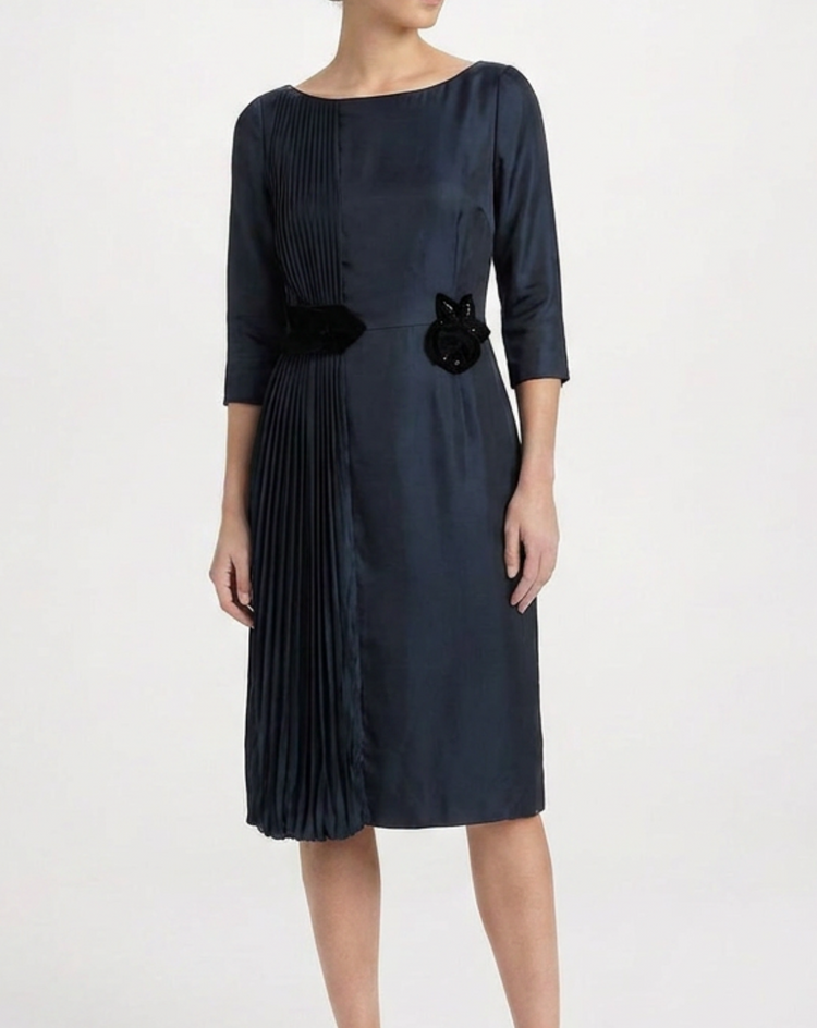 Prada charcoal silk pleated dress with flowing fabric and elegant design, perfect for formal occasions or stylish events.