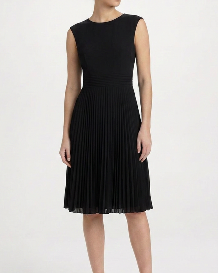 Black Prada pleated midi dress hanging on a mannequin, showcasing elegant fabric and classic design details.