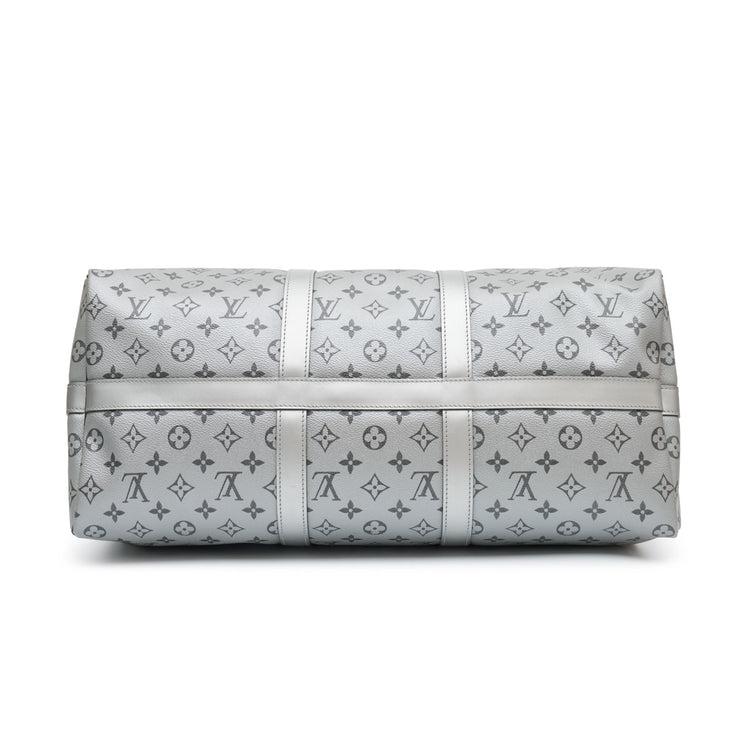 Louis Vuitton Eclipse Monogram Keepall Bandouliere 50 travel bag with adjustable strap and spacious interior.
