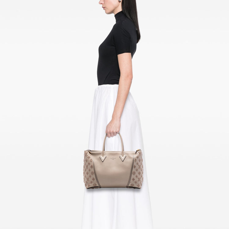 Louis Vuitton Veau Cachemire Tote PM handbag with soft beige leather and subtle stitching, stylish and spacious for everyday use.