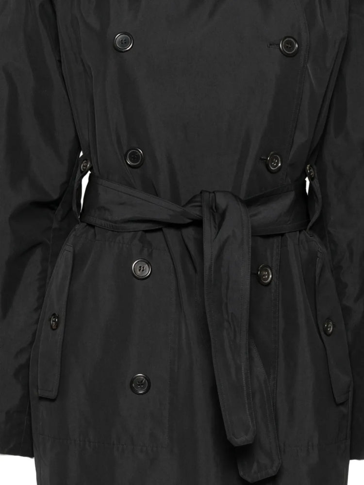 Pre-owned black Saint Laurent trench coat with classic double-breasted design and belt, displayed on a mannequin.