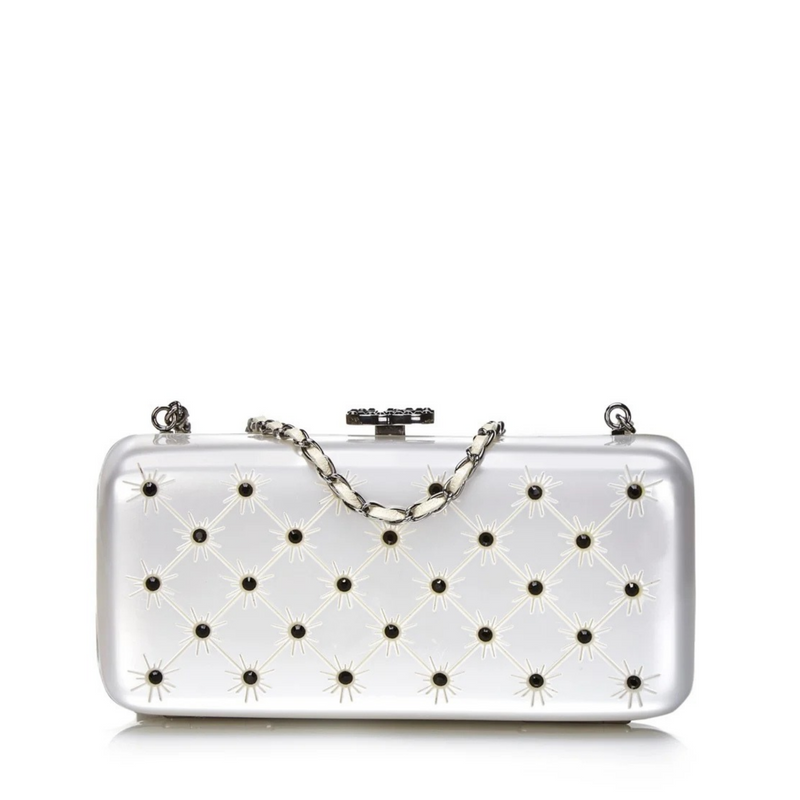 Silver crystal-encrusted Chanel clutch purse, elegant minaudiere with sparkling embellishments and a sleek design.