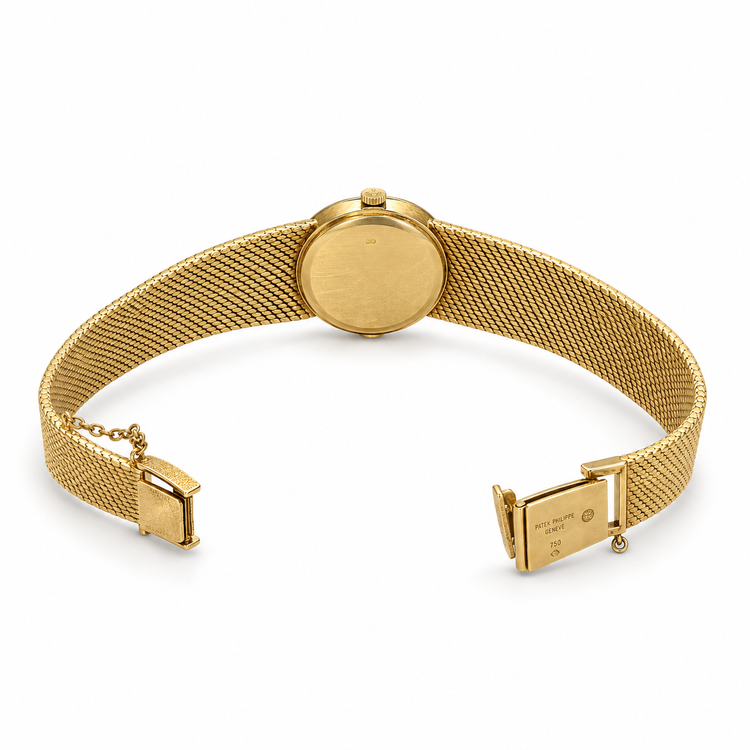 Vintage Patek Philippe Ellipse Reference 4139/1 ladies’ 18K gold manual-wind bracelet watch with textured dial, hammered bezel and integral woven gold bracelet.