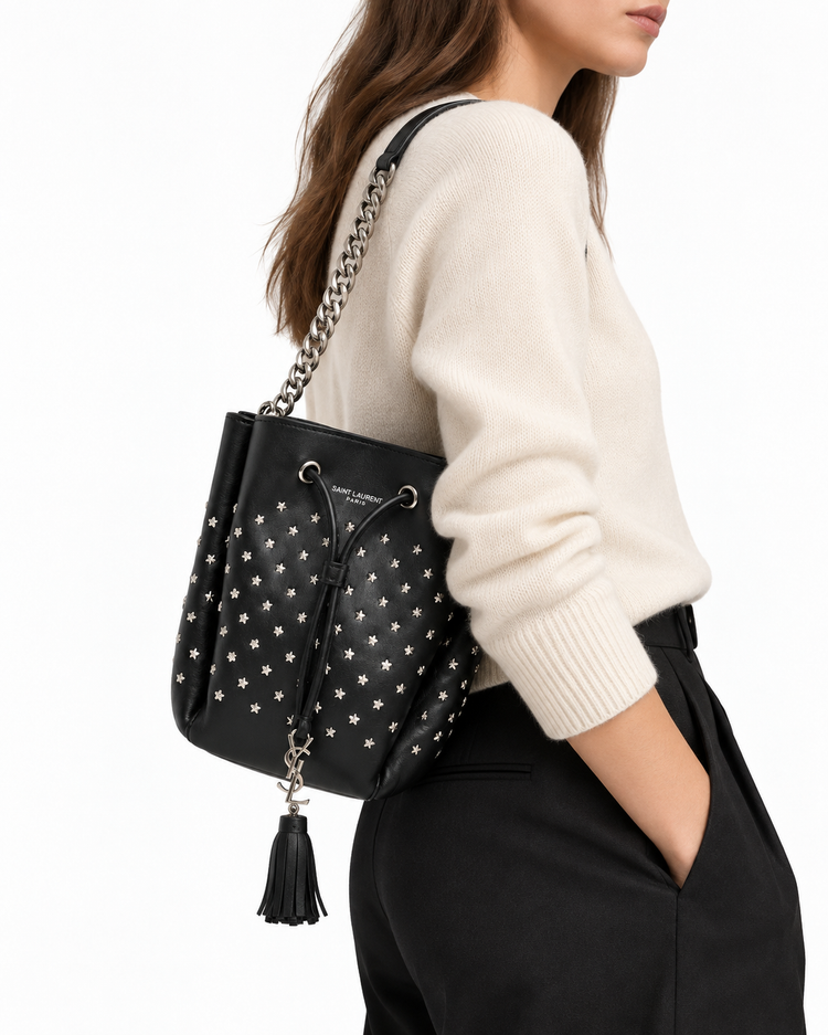 Yves Saint Laurent Small Emmanuelle Bucket Bag in leather, featuring shoulder strap and stylish design.