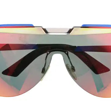 Dior Solar Shield sunglasses with vintage-inspired design, featuring dark tinted lenses and sleek black frames.