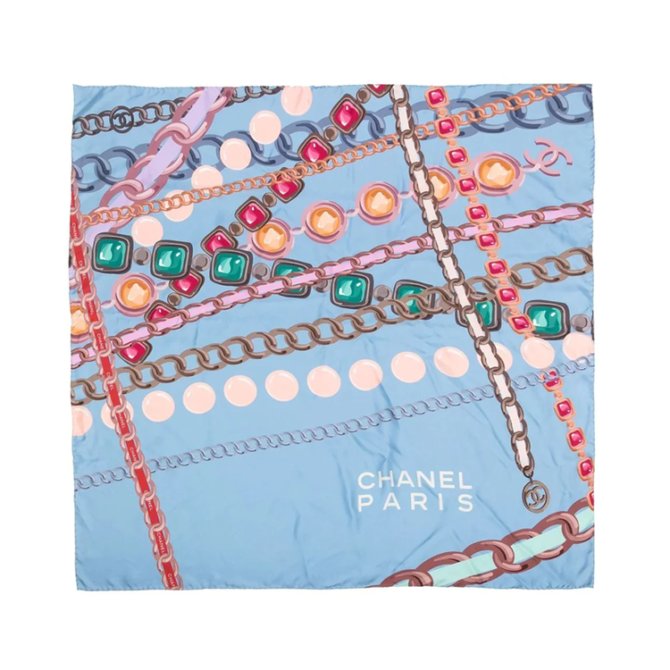 Chanel blue silk scarf with chain motif featuring elegant design and vibrant colors, perfect for stylish accessories.