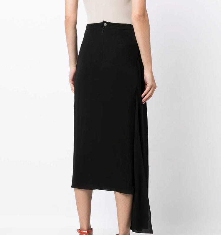 Chanel asymmetric silk midi skirt shown from the back, elegant design with flowing fabric and stylish silhouette.