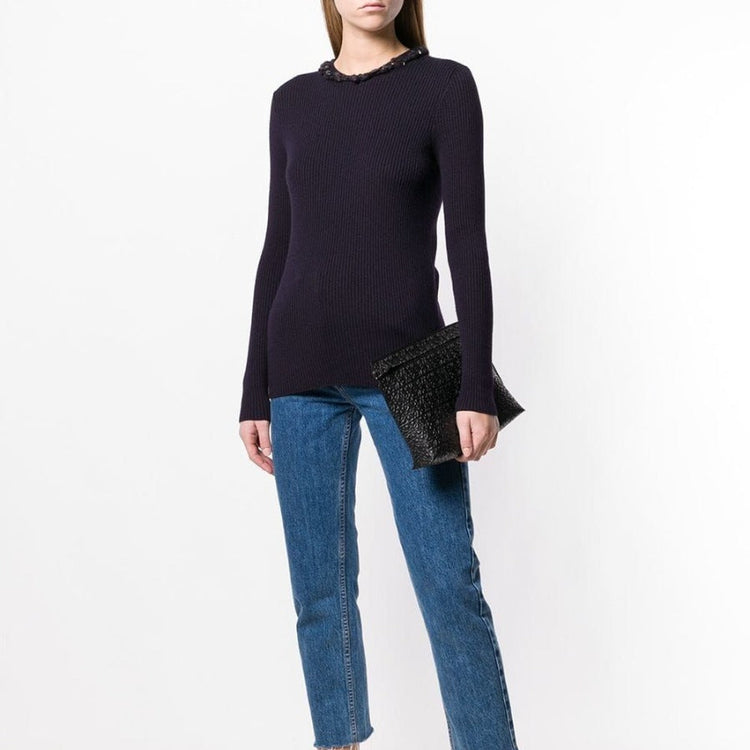 Chanel plum embellished jumper featuring intricate beadwork and textured knit fabric, displayed on a neutral background.