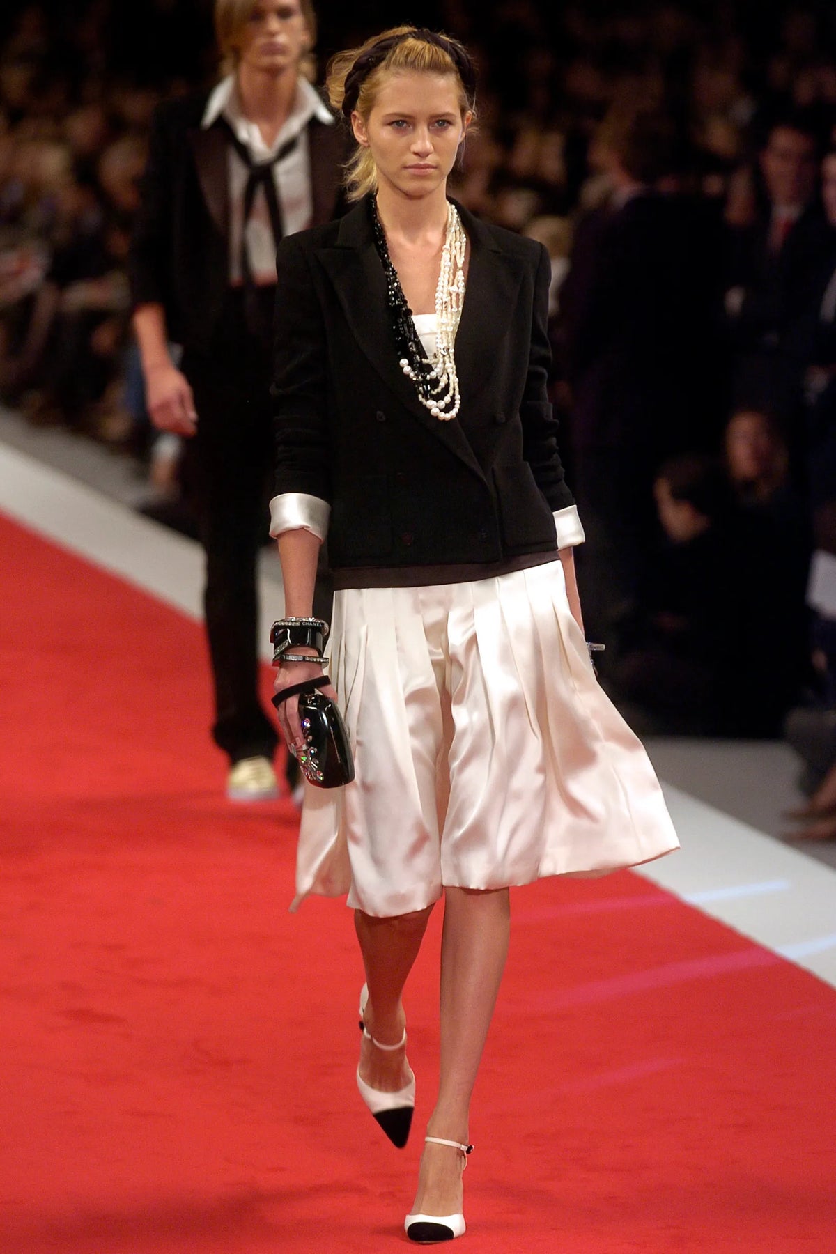 Chanel 2005 Jewel Black Resin Minaudière clutch with intricate design, perfect for evening occasions.