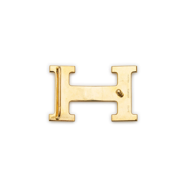Hermès belt buckle in 18K rose gold with diamond accents, showcasing a luxurious and elegant design.