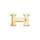 Hermès belt buckle in 18K rose gold with diamond accents, showcasing a luxurious and elegant design.