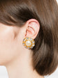 Pair of vintage 1970s Chanel gold-plated clip-on flower earrings featuring a central faux pearl cabochon surrounded by a halo of clear crystals.