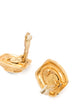 Pair of vintage 1990s Chanel clip-on earrings in gold-plated textured metal centered with large hexagonal clear crystal stones.