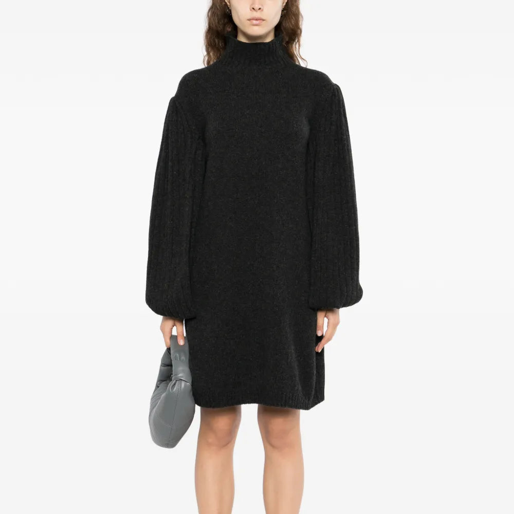 Charcoal knitted cashmere dress by Chanel from 2007, showcasing a cozy, stylish design with a fitted silhouette.