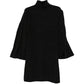 Chanel 2007 charcoal knitted cashmere dress featuring a fitted silhouette and long sleeves, displayed on a mannequin.