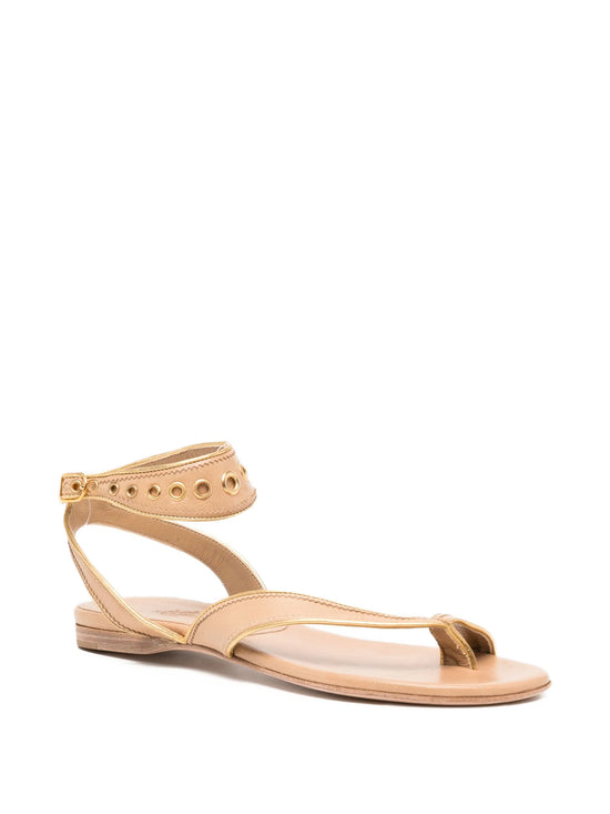 Beige sandal with thin strap and open toe on a white background