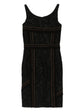 Prada Black dress with orange stitching on a white background
