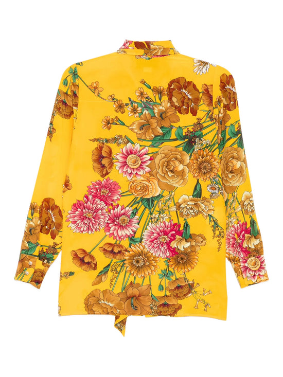 Gucci Yellow floral blouse with a vibrant pattern on a white background