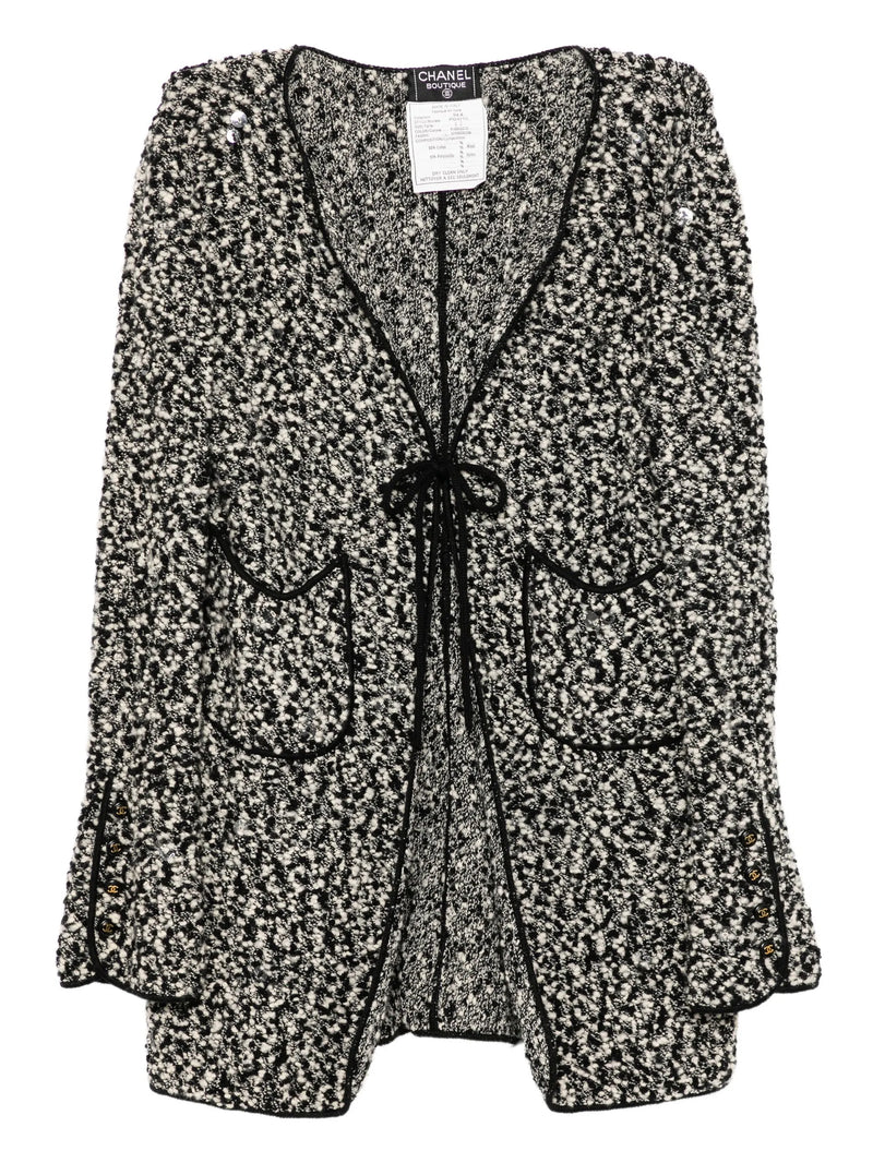 Chanel monochrome tweed tie-front cardigan, blazer-style jacket with textured fabric and tailored fit.