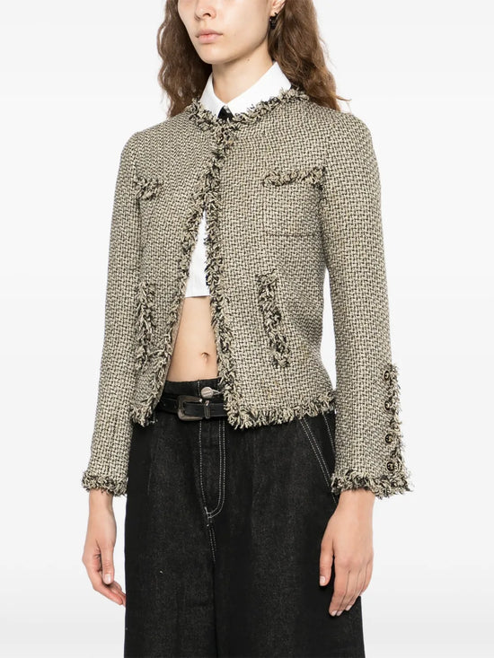 Chanel black and gold tweed blazer jacket with classic tailored fit and elegant gold accents, stylish for formal or casual wear.