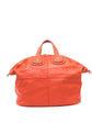 Givenchy Nightingale handbag with sleek leather design and silver hardware, featuring top handles and spacious interior.